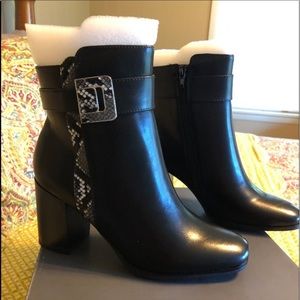 Black ankle booties with snakeskin detail